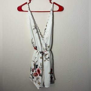 White romper with flower details